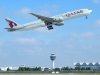 A7-BAO Qatar Airways Boeing 777-3DZ(ER) (4).jpg